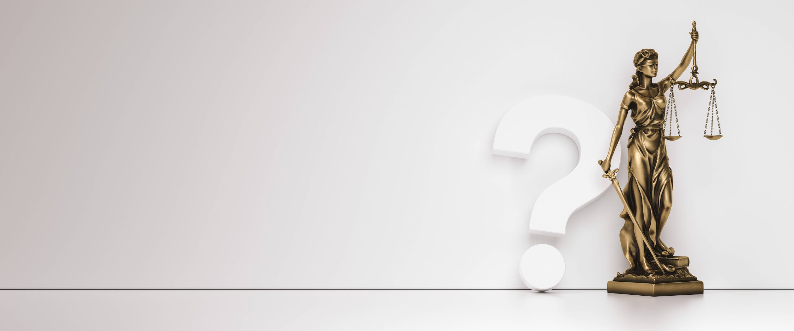 Lady Justice figurine beside a question mark