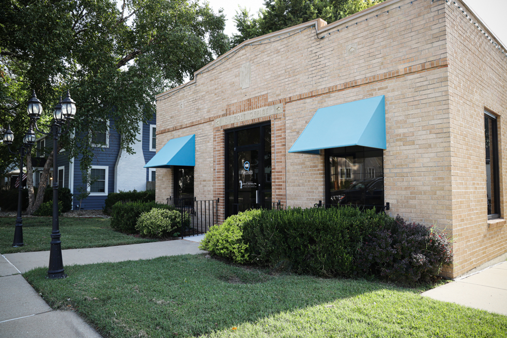 Dietrick Law office building with blue awnings in Topeka, Kansas